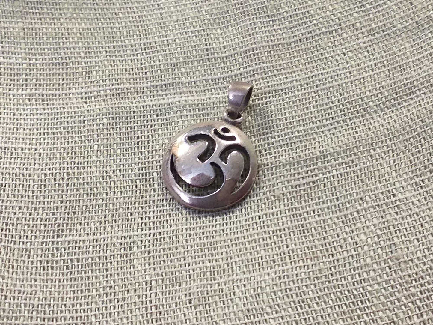 Sterling Cut-out Circle Om Pendant