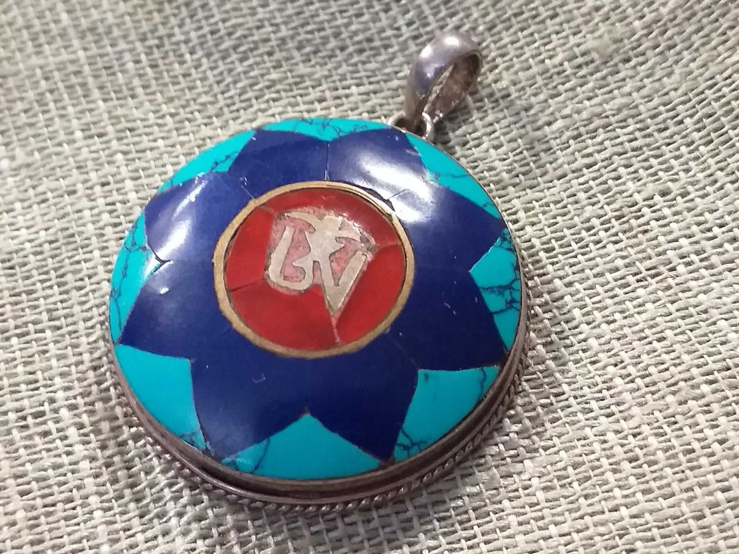 Tibetan Om Star Pendant