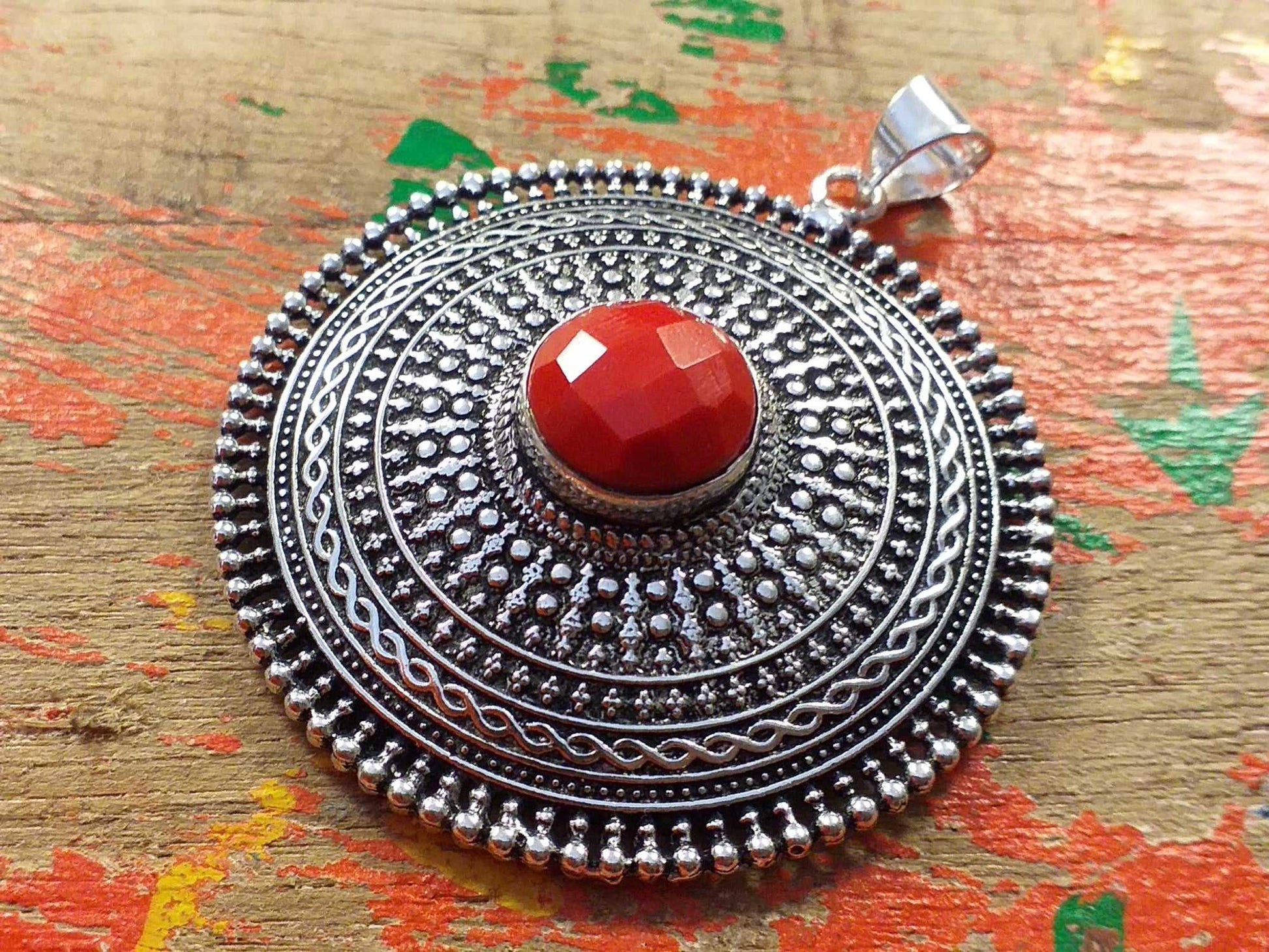 Faceted Stone Shield Pendant