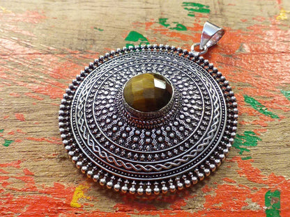Faceted Stone Shield Pendant